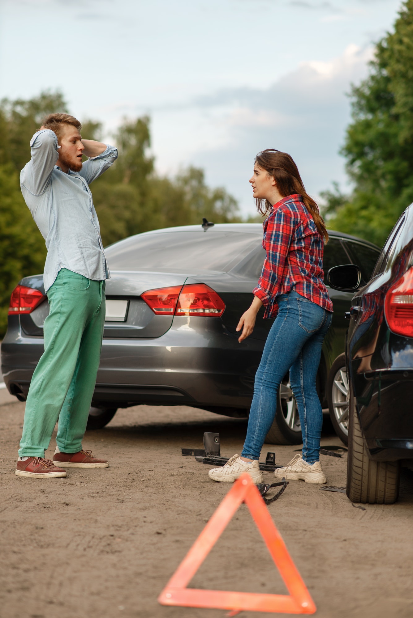 car-accident-on-road-man-and-woman-are-sorted-out.jpg